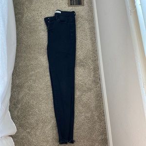 Raw hem, fly button, high rise kancan skinny black jeans. Great condition.